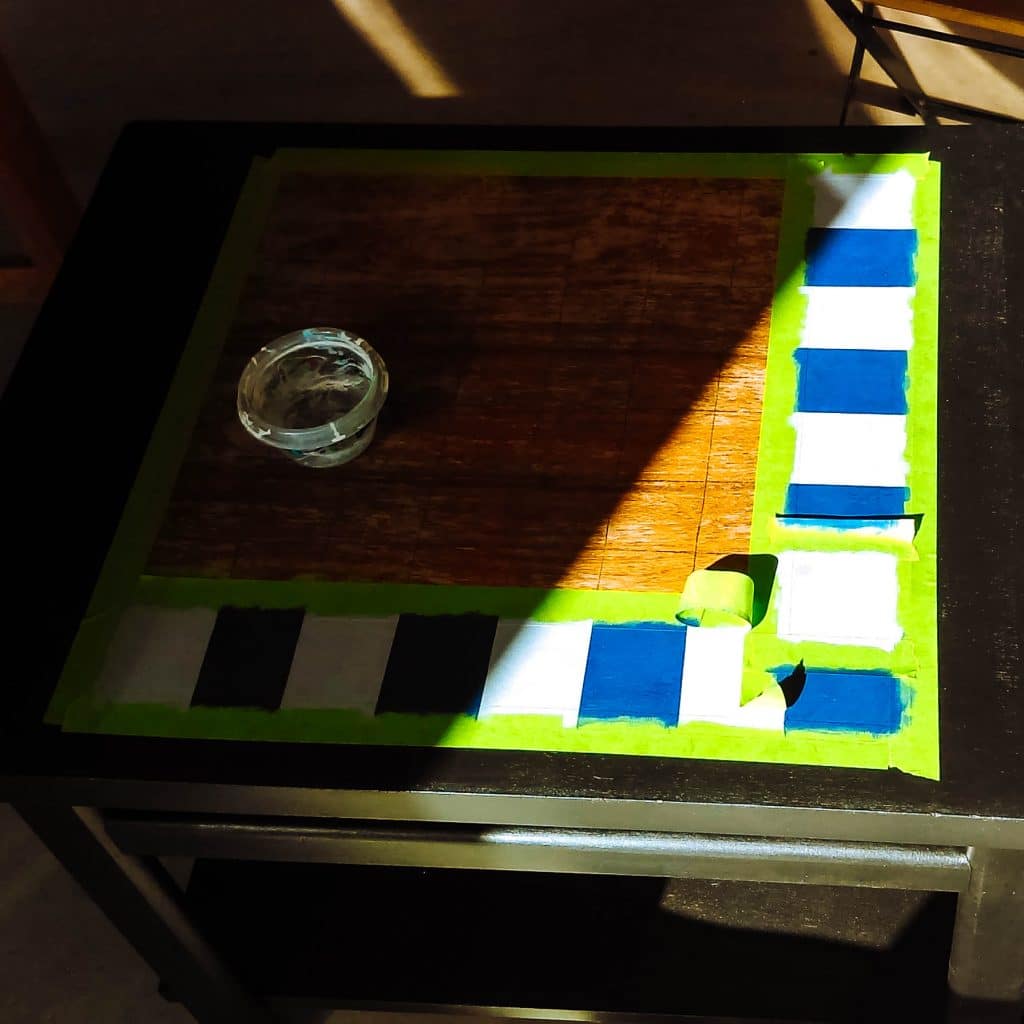 Painting checker board top.